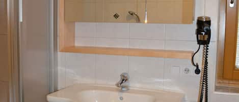 Hair dryer, towels, toilet paper