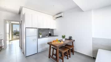 Apartemen, balkon | Dapur pribadi | Lemari es, oven, kompor, dan ketel listrik