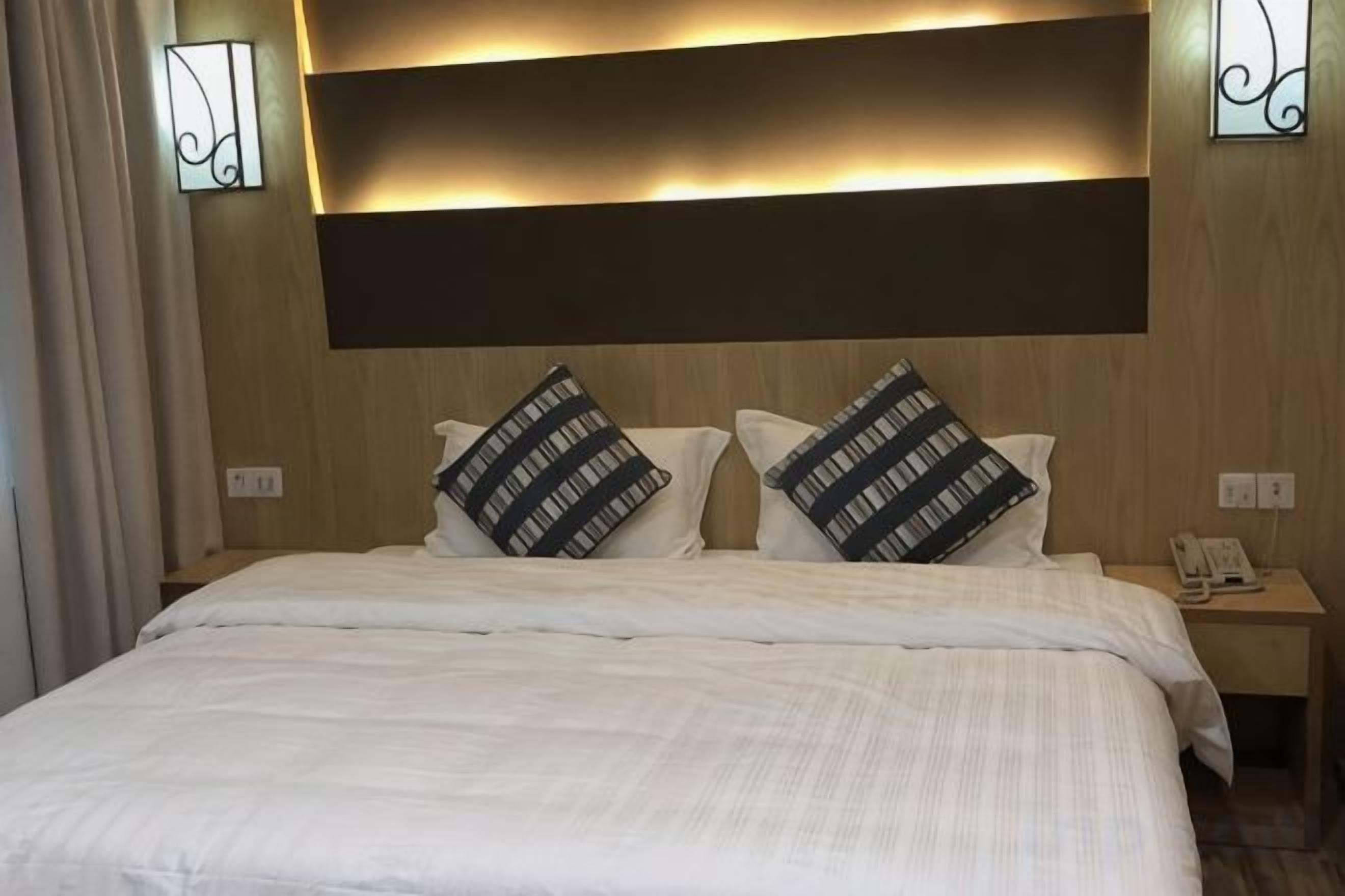 Down comforters, desk, blackout drapes
