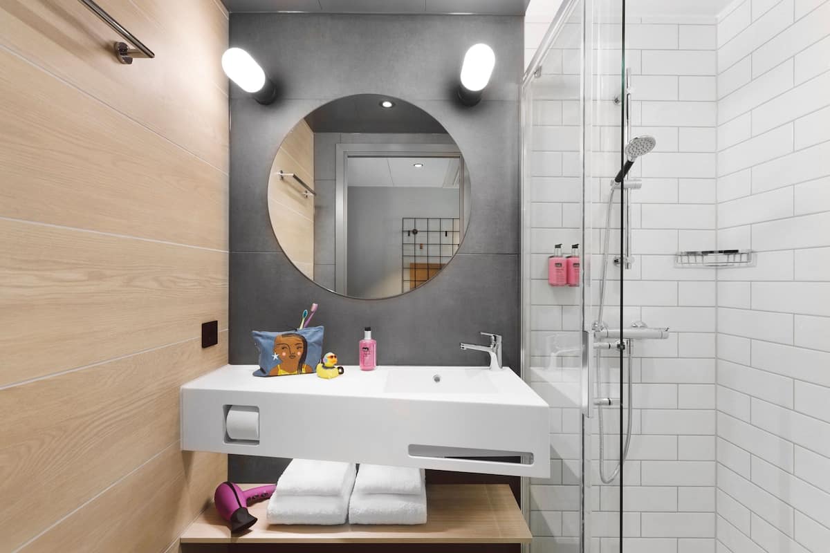 shower, eco-friendly toiletries, hair dryer, towels