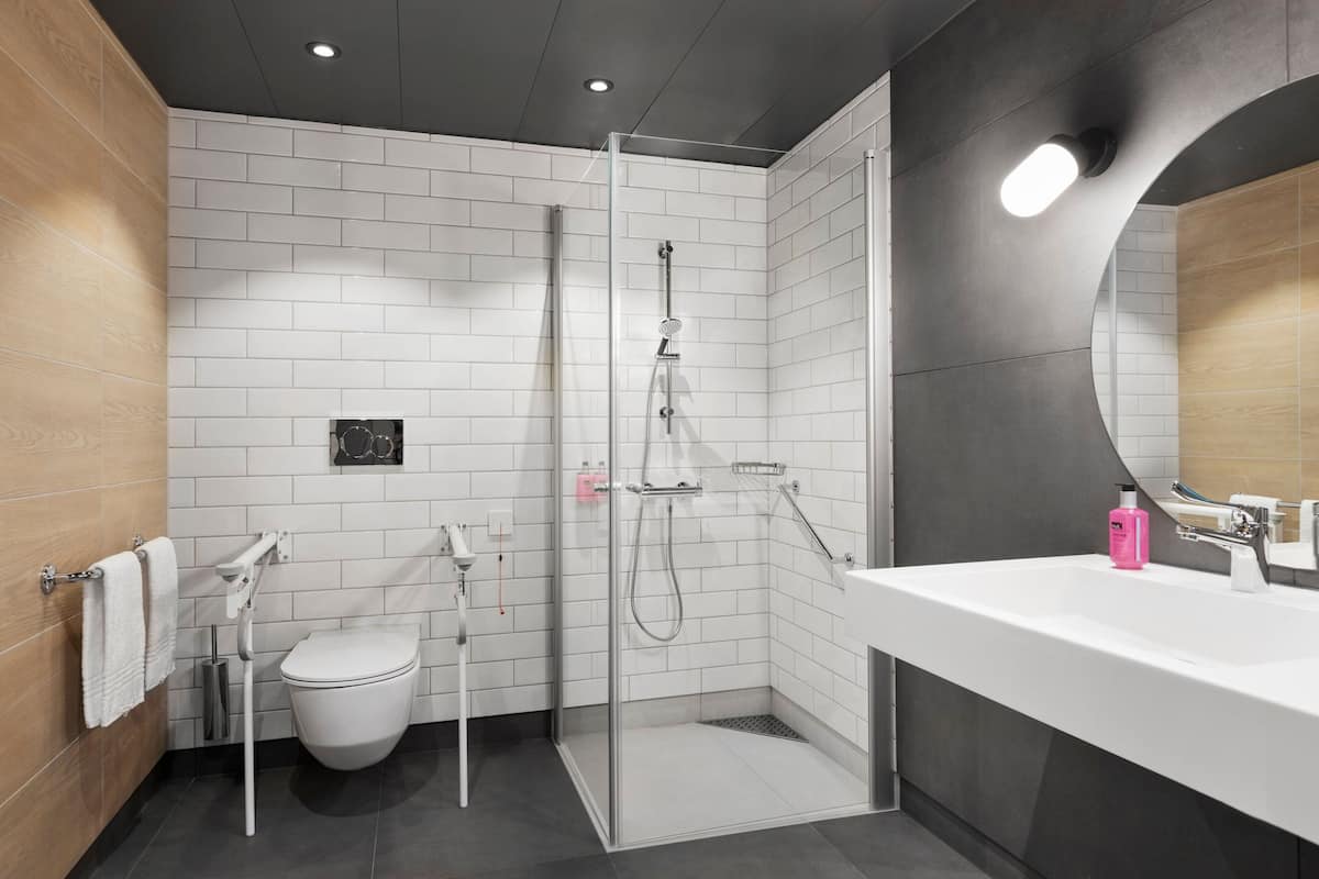 shower, eco-friendly toiletries, hair dryer, towels