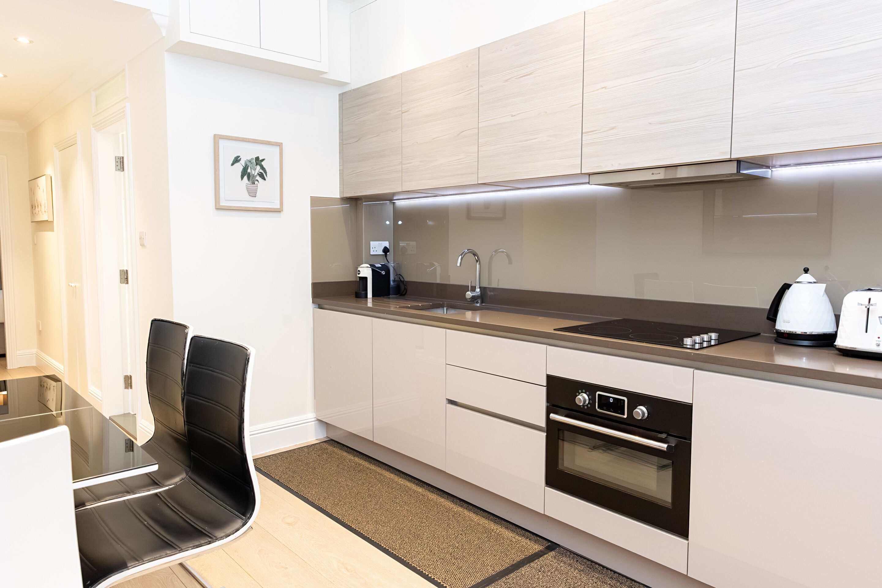 Coffee/tea maker, fridge, microwave, oven