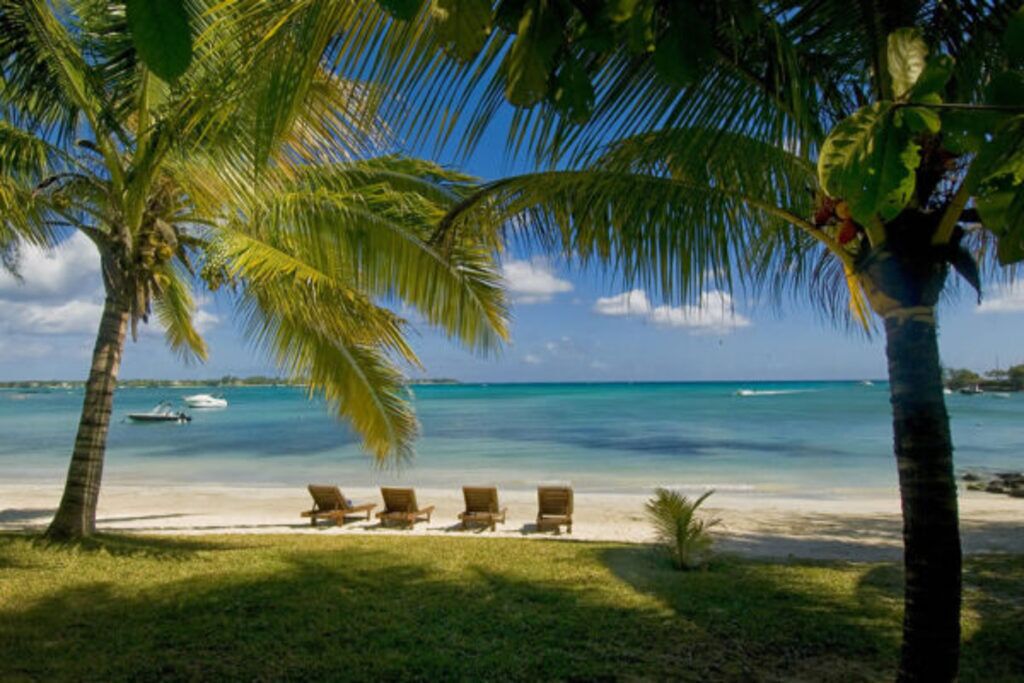 On the beach, sun-loungers, beach towels