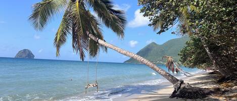 On the beach, sun loungers, beach towels