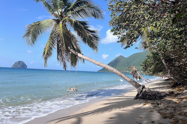 On the beach, sun loungers, beach towels