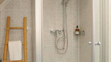 Shower, towels, soap, shampoo