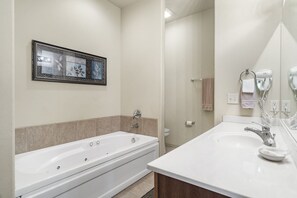 Condo, Multiple Beds, Patio, Garden View (Silver Dollar Hideaway) | Bathroom | Hair dryer, towels