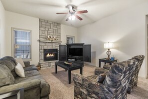 Condo, Multiple Beds, Patio, Garden View (Silver Dollar Hideaway) | Living area | 42-inch flat-screen TV with digital channels, fireplace