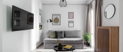Standard Apartment | Living area | 43-inch TV with digital channels, Netflix, streaming services