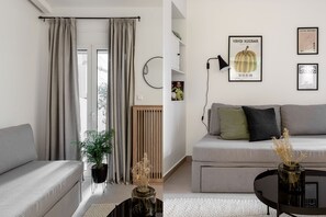 スタンダード アパートメント | リビング エリア | 43 インチのテレビ (デジタル放送視聴可)、Netflix、ストリーミングサービス