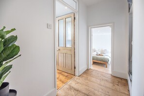 2 bedrooms, laptop workspace, iron/ironing board, bed sheets