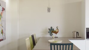 Deluxe Apartment | Dining room - Deluxe & Terrace with City Overview by FeelHome (Holon)