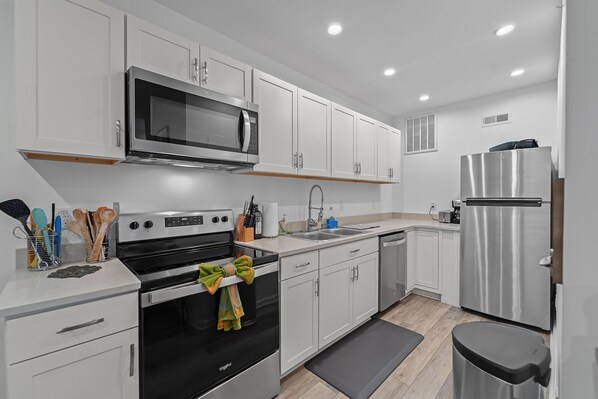 Fridge, microwave, oven, stovetop - Cozy Pinehurst 2BR Apartment w/3 Beds • Across from Pinehurst #6 • Firepit

 (Pinehurst)