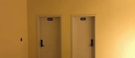 Two closed doors with numbers 805 and 806, indicating hotel room numbers.