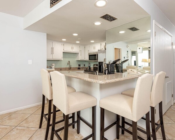Condo, 2 Bedrooms | Private kitchen | Fridge, oven, coffee/tea maker