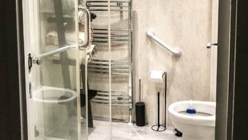 Shower, hair dryer, towels, soap