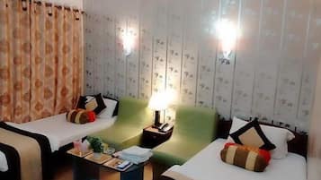 Chambre Double Deluxe | Fer et planche Ă  repasser, Wi-Fi gratuit, draps fournis