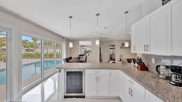 House, Multiple Beds, Pool Access, Pool View | Private kitchen | Fridge, microwave, oven, stovetop