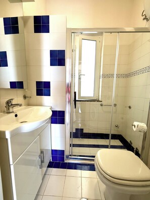 Shower, bidet, toilet paper