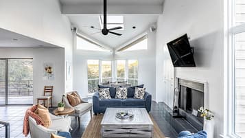 House, Multiple Beds, Balcony, Pool View | Living area | 50-inch flat-screen TV with digital channels, fireplace