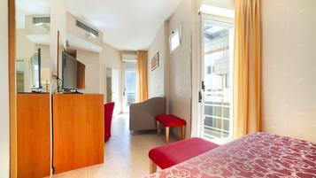 Family Room | Down duvets, in-room safe, desk, travel cot
