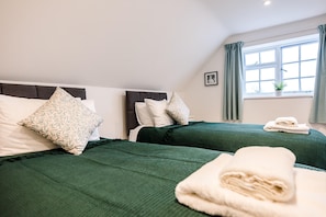 2 bedrooms, laptop workspace, iron/ironing board, bed sheets