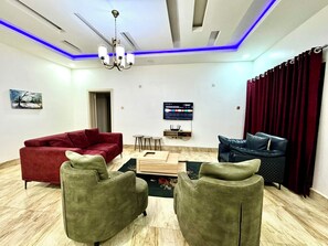 Appartement Majestueux, 1 chambre | Coin séjour