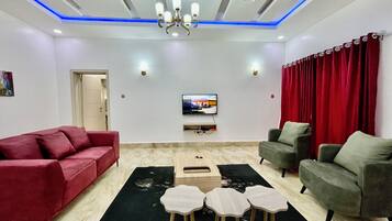 Grand Apartment, 1 Bedroom | Living area | 43-inch Smart TV with digital channels, Netflix, streaming services