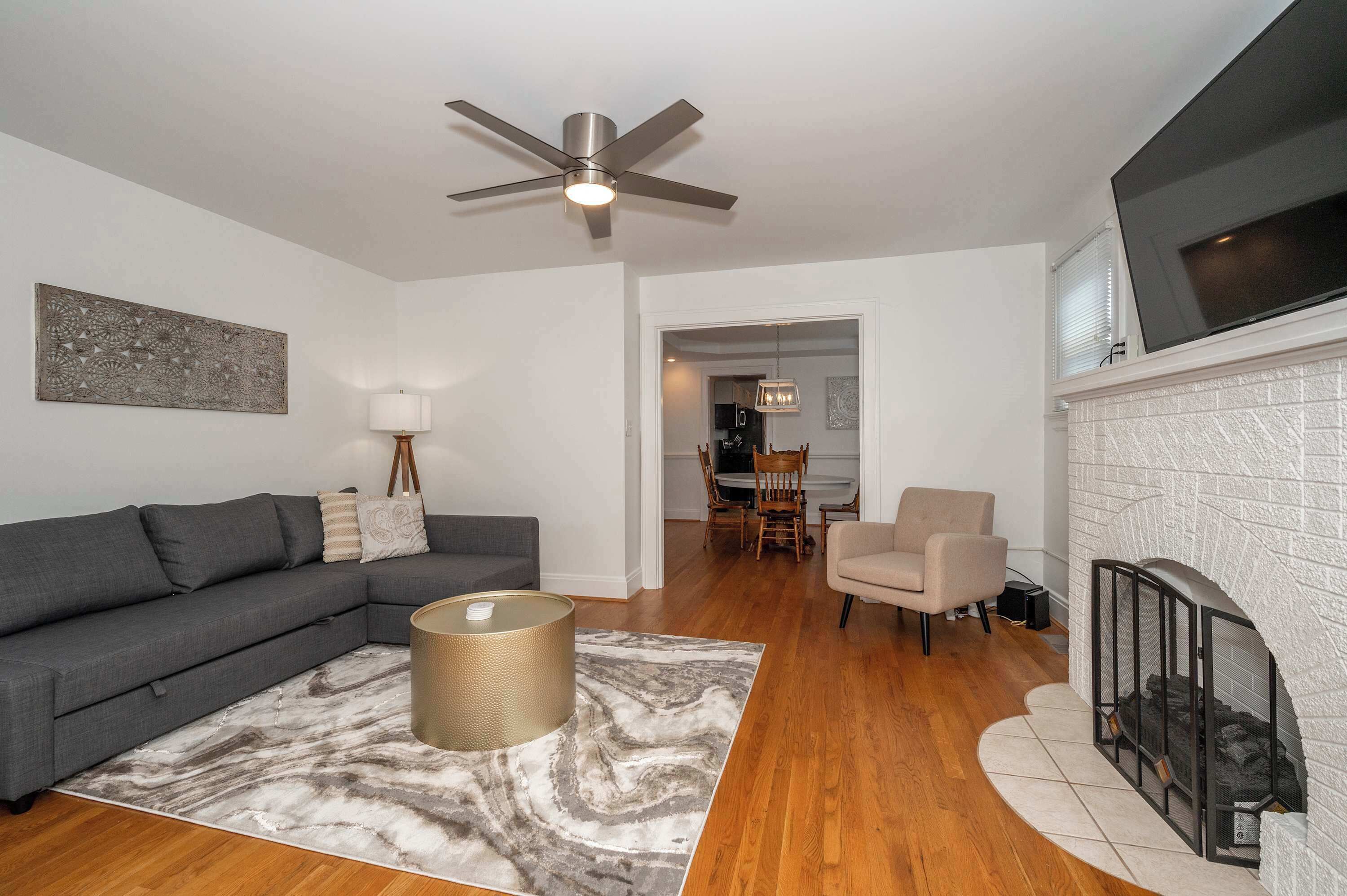 Condo, 1 Queen Bed, Balcony, Garden View | Living area | 40-inch TV with digital channels, fireplace