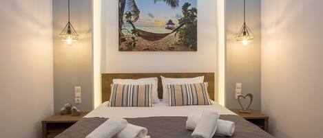 1 habitación, tabla de planchar con plancha, wifi gratis y ropa de cama