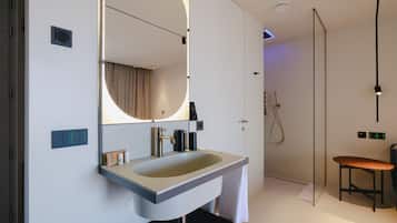 Premium bedding, down duvets, memory-foam beds, in-room safe
