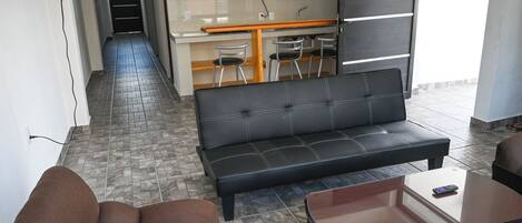 Family Room, Ensuite, Tower | Living area | 32-inch Smart TV with digital channels, TV, heated floors