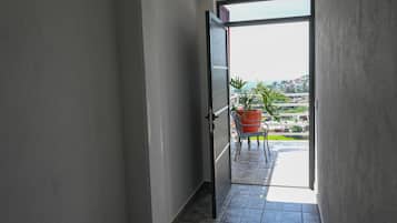 Habitación familiar, baño en la habitación, torre | Camas con pillow-top, wifi gratis y ropa de cama