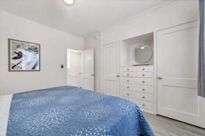 1 bedroom, desk, iron/ironing board, travel crib