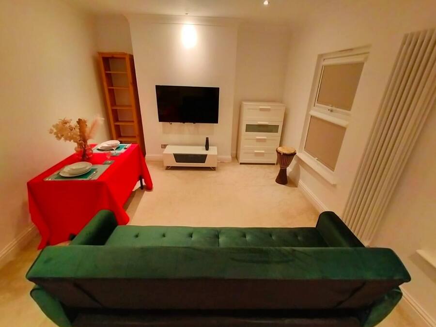 Apartment | Living area | 30-inch TV with digital channels