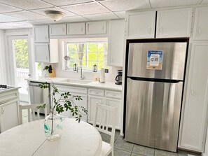 Fridge, microwave, oven, stovetop - Bootleggers: Walk to Downtown Saugatuck, Fire Pit, Deck, Pet-Friendly (Saugatuck)