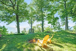 Fire pit area on the bluff overlooking Lake Michigan has plenty of chairs and a picnic table