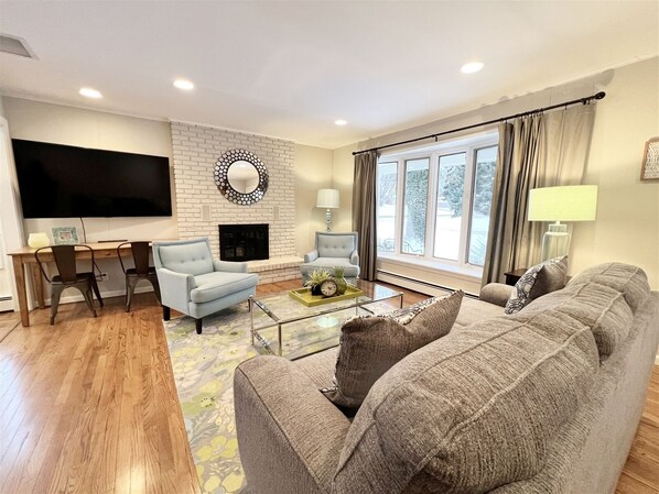 Flat-screen TV, fireplace