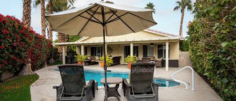 Outdoor pool, pool umbrellas, sun loungers