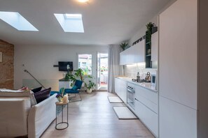 Loft Basic, 1 letto matrimoniale con divano letto | Interni