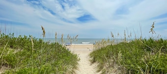 OBX beach steps away, ocean views, prvt pool, hot tub, game room & dog friendly!