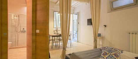 Basic Apartment, 1 Queen Bed | 1 bedroom, laptop workspace, iron/ironing board, bed sheets