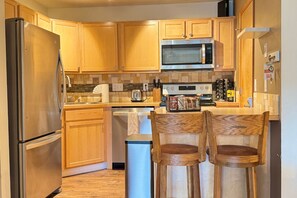 Fridge, microwave, oven, stovetop - Moose Ridge Retreat - Steps from Big Sky Resort (Gallatin Gateway)