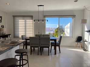 Family Townhome | Living area | Flat-screen TV