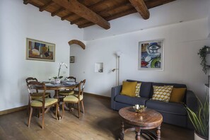 Basic Apartment, Multiple Beds | Living area | TV - Oltrarno Modern Apartment in Florence (Florence)
