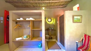 Ducha, artículos de tocador gratuitos, toallas, jabón
