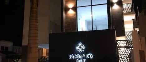 A modern building with a sign reading "ESCONDIDO BLUE".