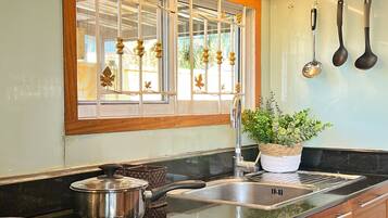 Fridge, stovetop, electric kettle, toaster