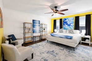 Retreat to the spacious king bedroom, where comfort and relaxation await every evening.