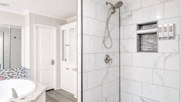 Bathtub, hair dryer, towels